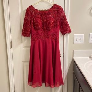 JJ’s House burgundy lace and sequin formal dress.
